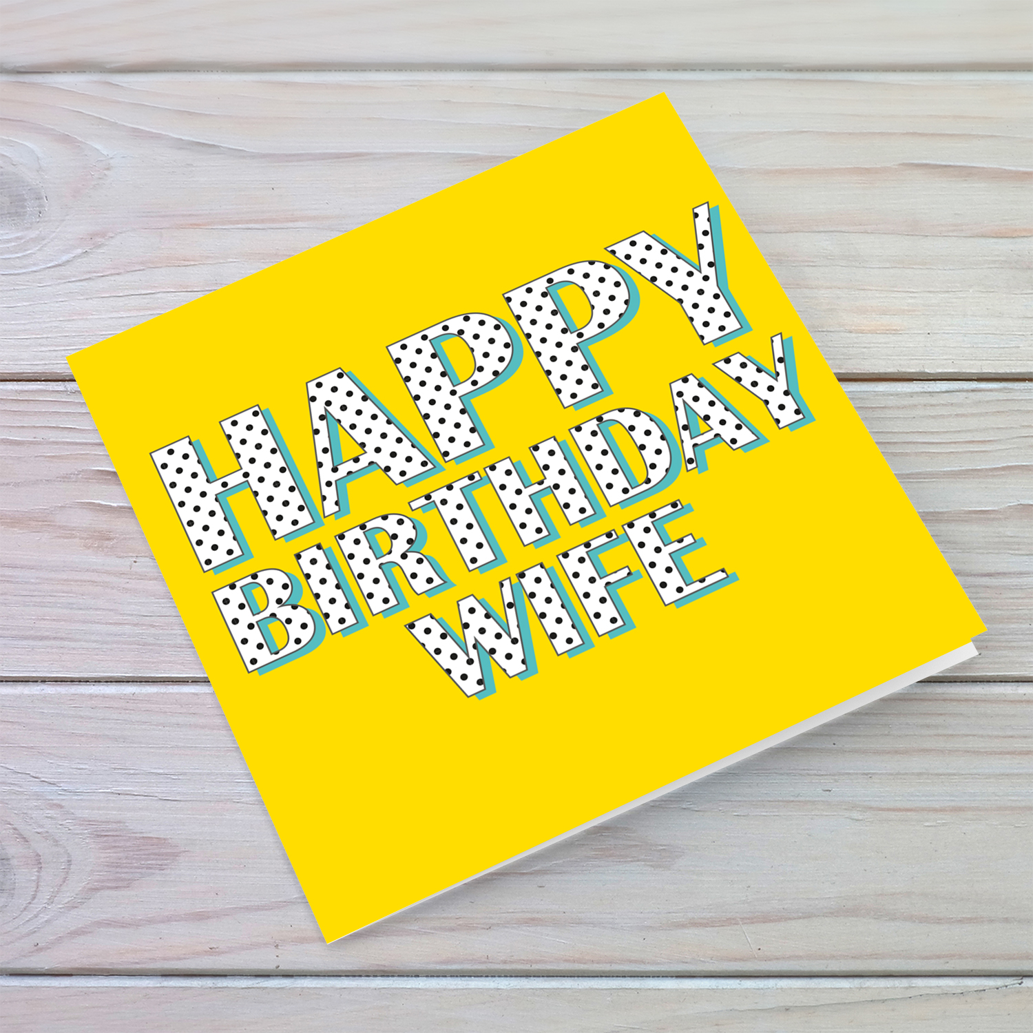 Yellow background with polka dot wording birthday card for wife in English