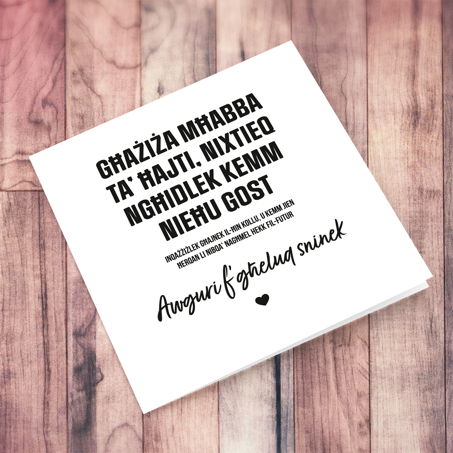 Funny minimalist birthday card in black text in Maltese (Female)