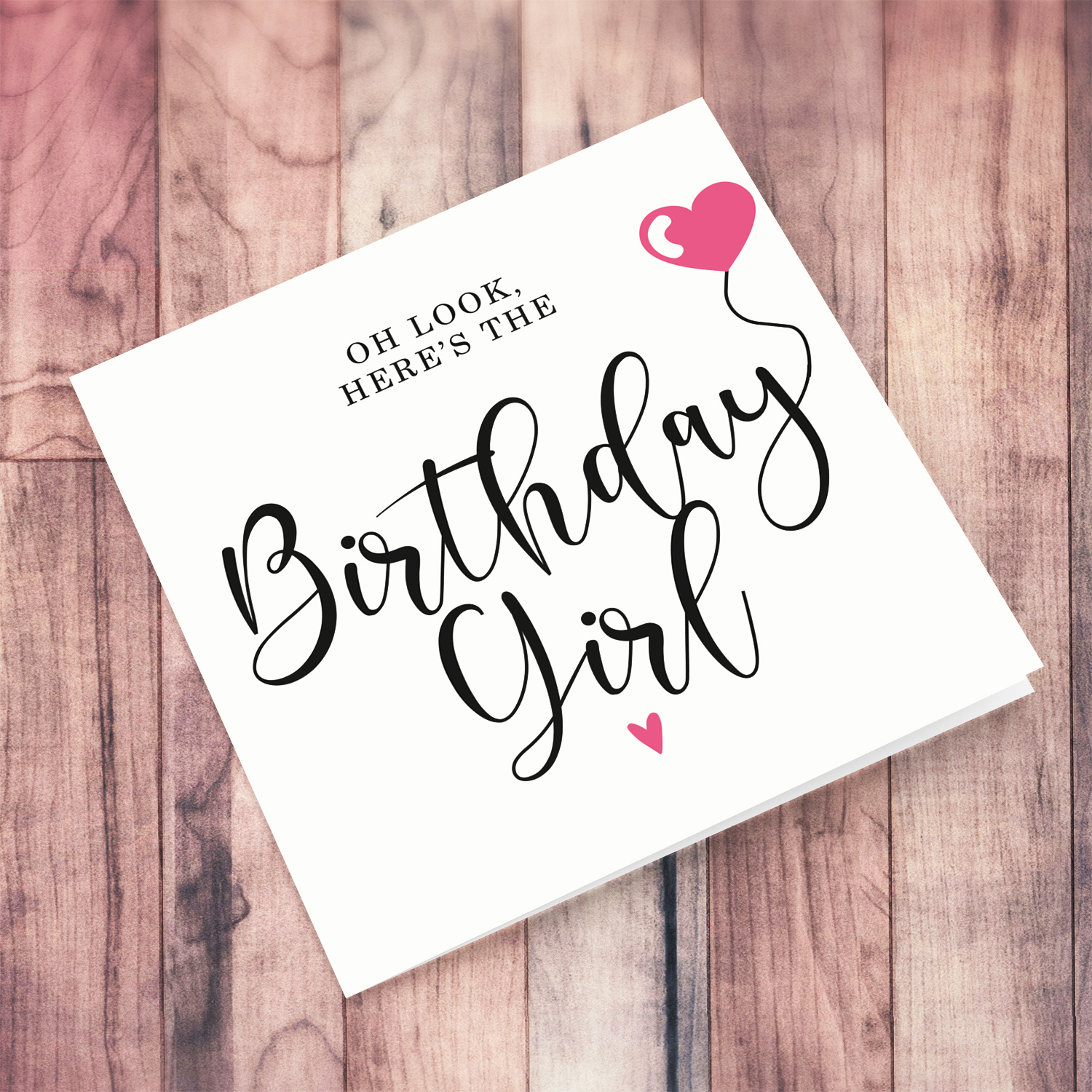 A beautiful minimalst birthday card for the Birthday Girl featuring a pink heart balloon in English