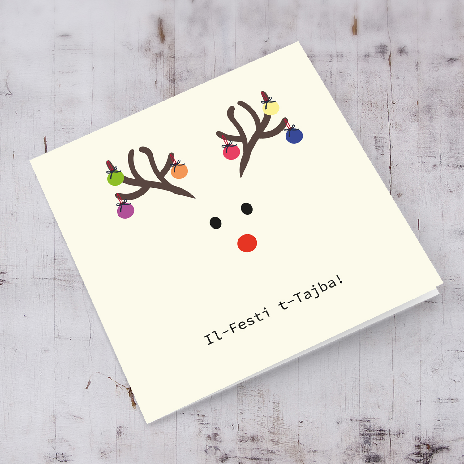 Reindeer with baubles themed Christmas card in Maltese