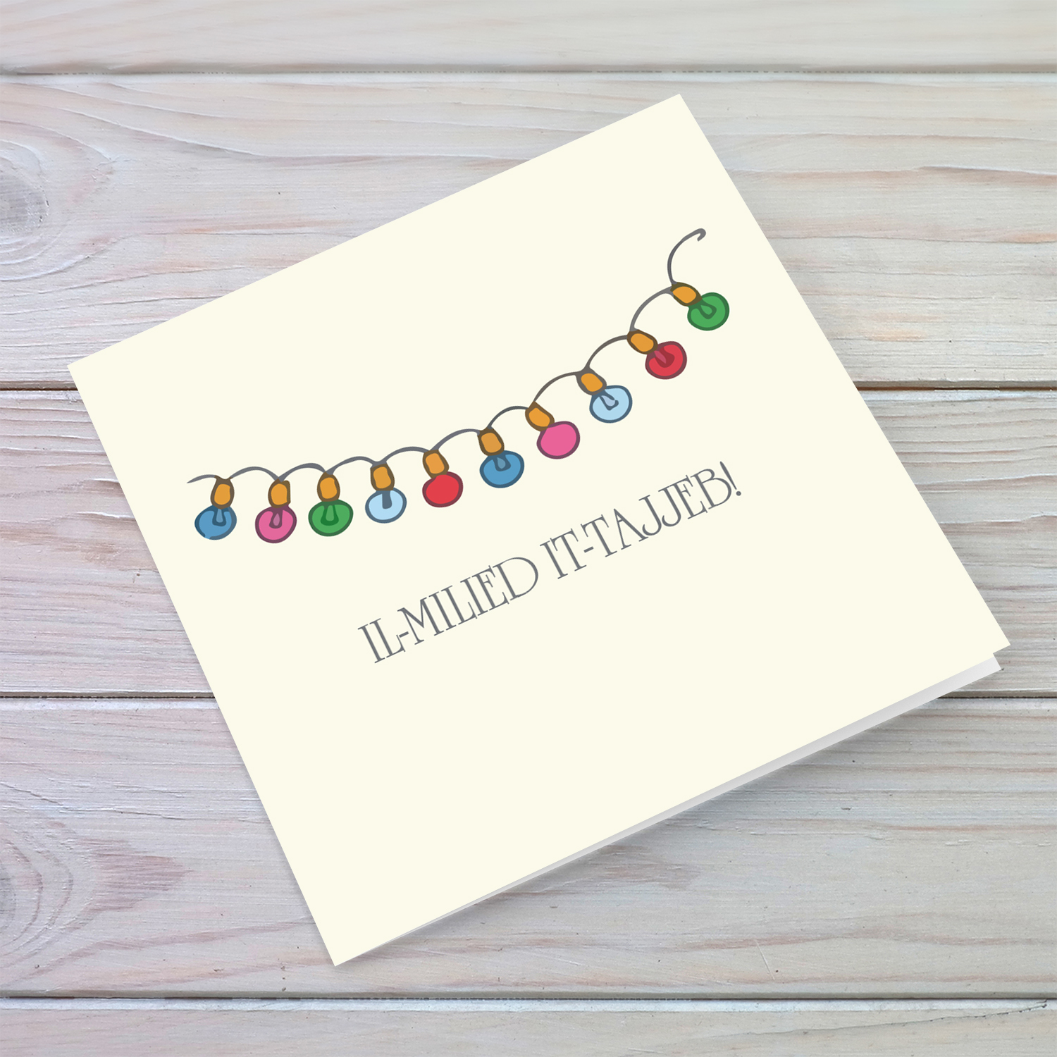 Minimalist Christmas lights themed Christmas card in Maltese