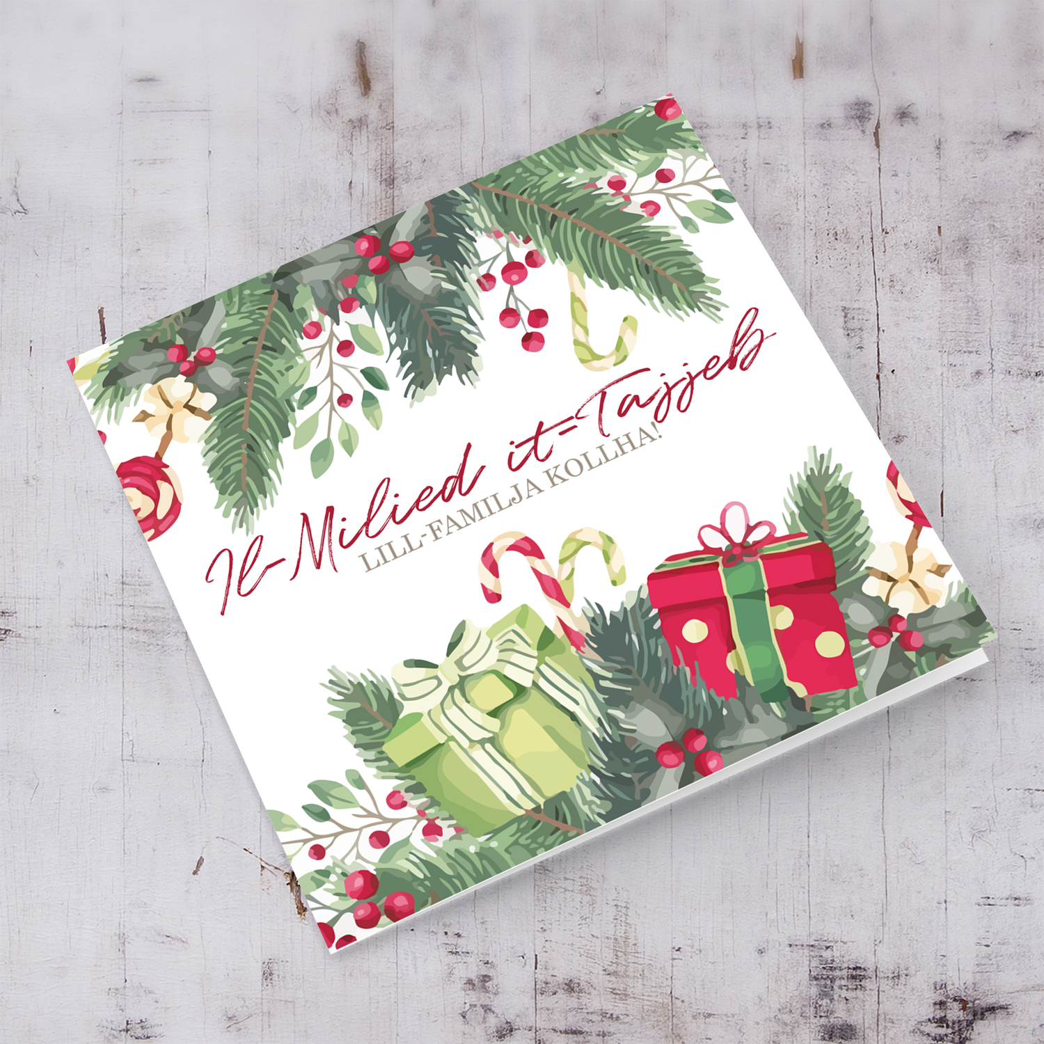 Christmas card with holly and presents in Maltese