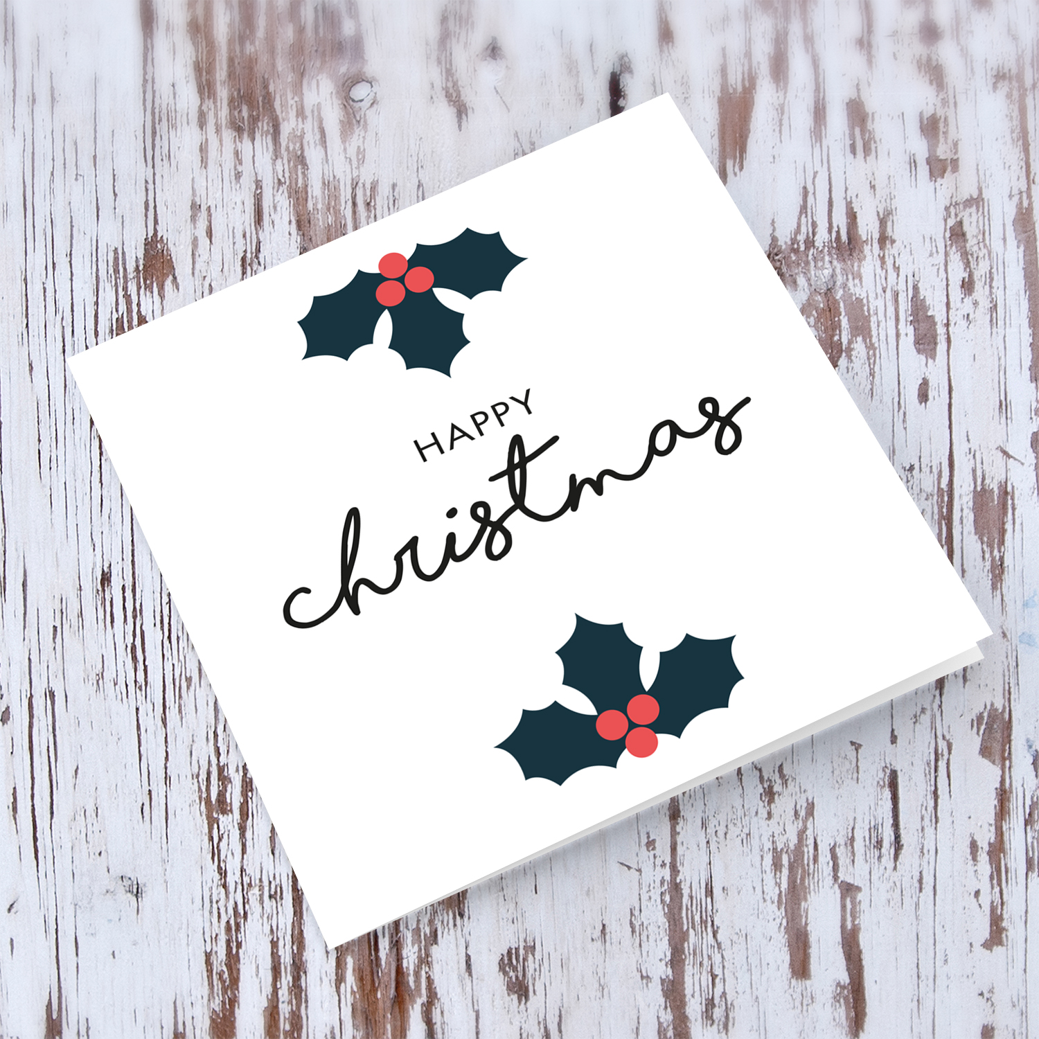 Minimalist Christmas card with hollies in English