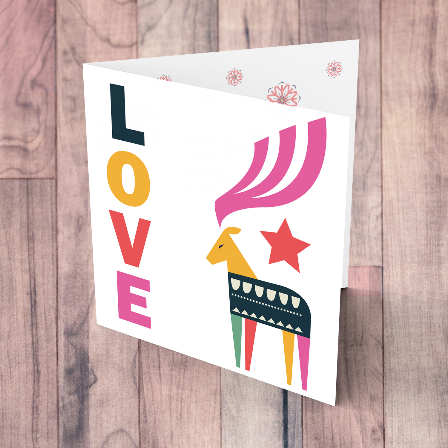 Reindeer themed Christmas card with the words LOVE in English