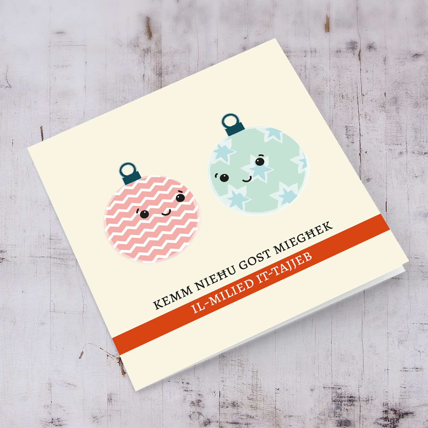 Cute two baubles hanging around Christmas Card in Maltese