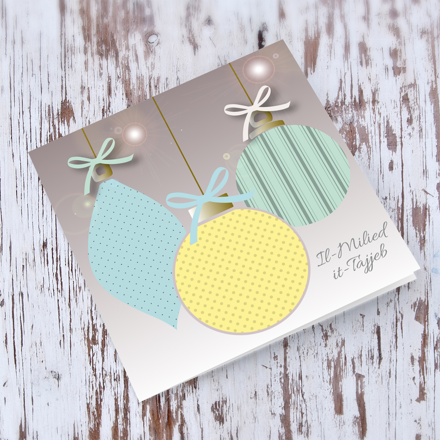 Bauble with different colours and patterns Christmas card in Maltese