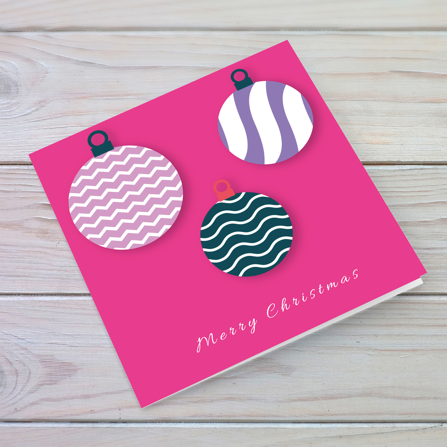 Bright fuchsia background Christmas bauble card in English 