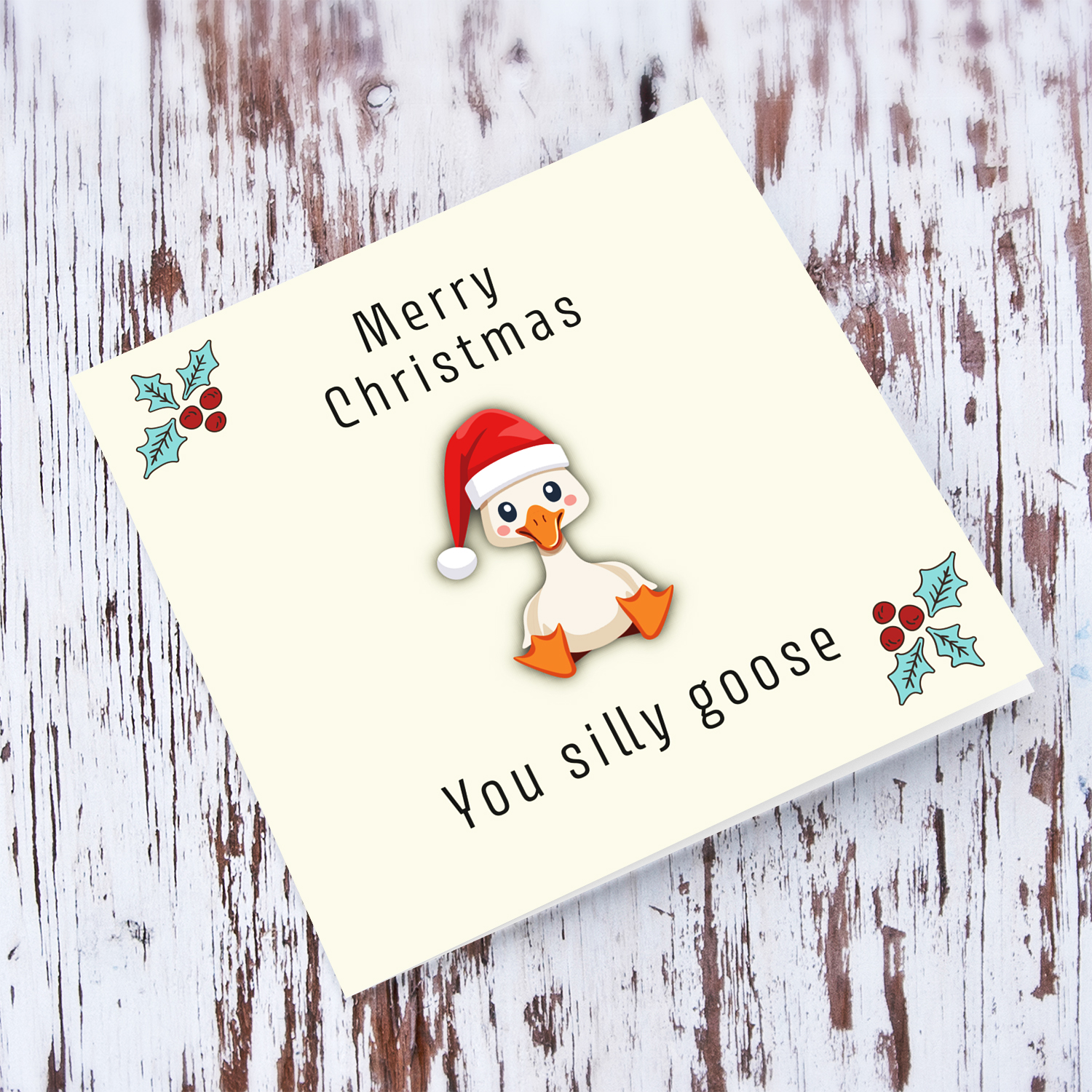 Cute and funny christmas card with a cute goose wearing a santa's hat in English