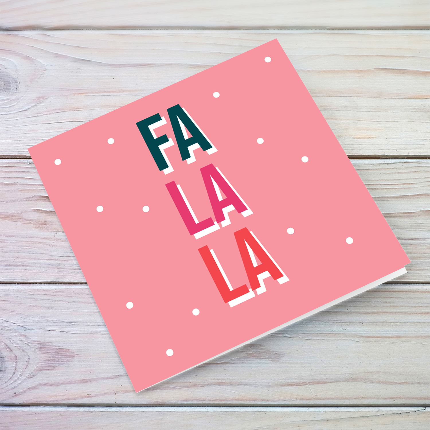 FA LA LA minimalist Christmas card in pink background and colourful text in English