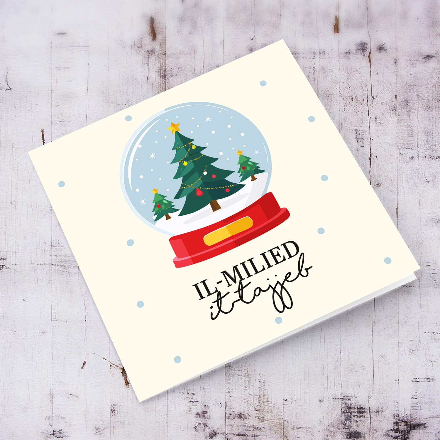 Cute Christmas bauble themed card in black text in Maltese