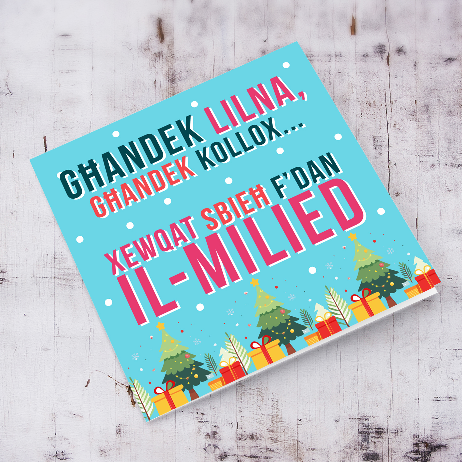 Funny Christmas card with blue background and colourful text in Maltese (PLURAL)