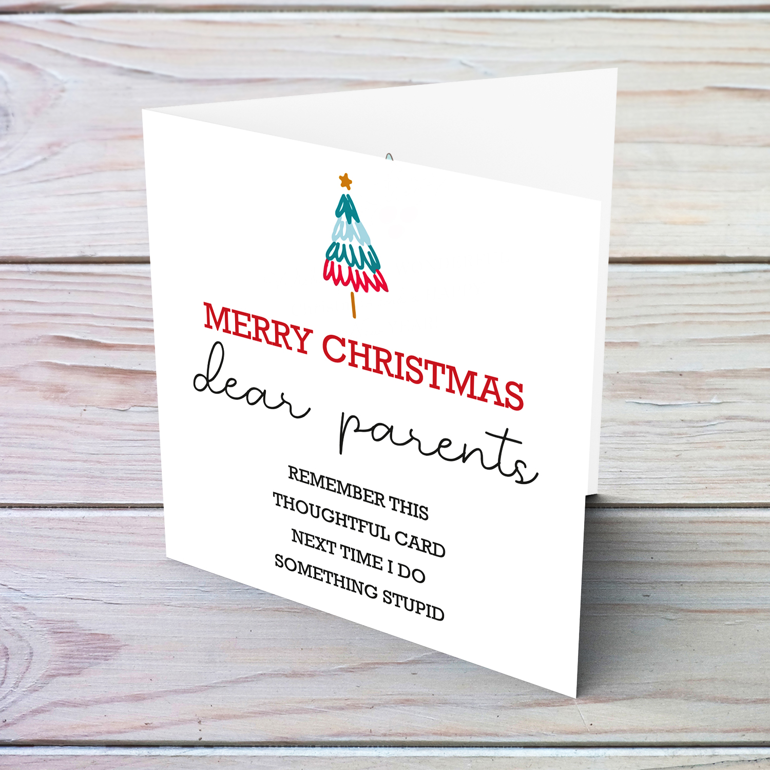 Funny minimalist Christmas card with small xmas tree for parents in English (SINGULAR)