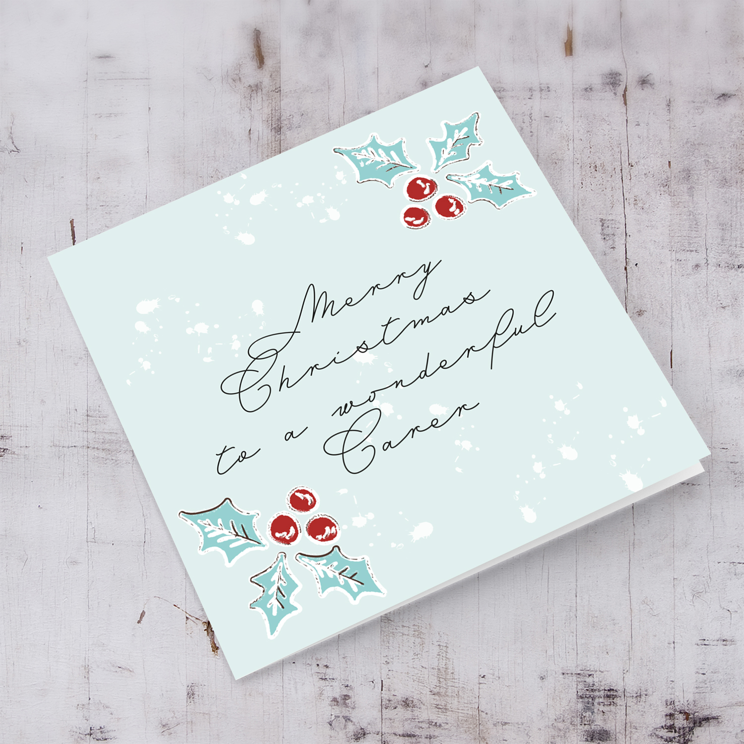 Carer - Christmas holly, scattered snow, and light background Christmas card for a wonderful carer in English