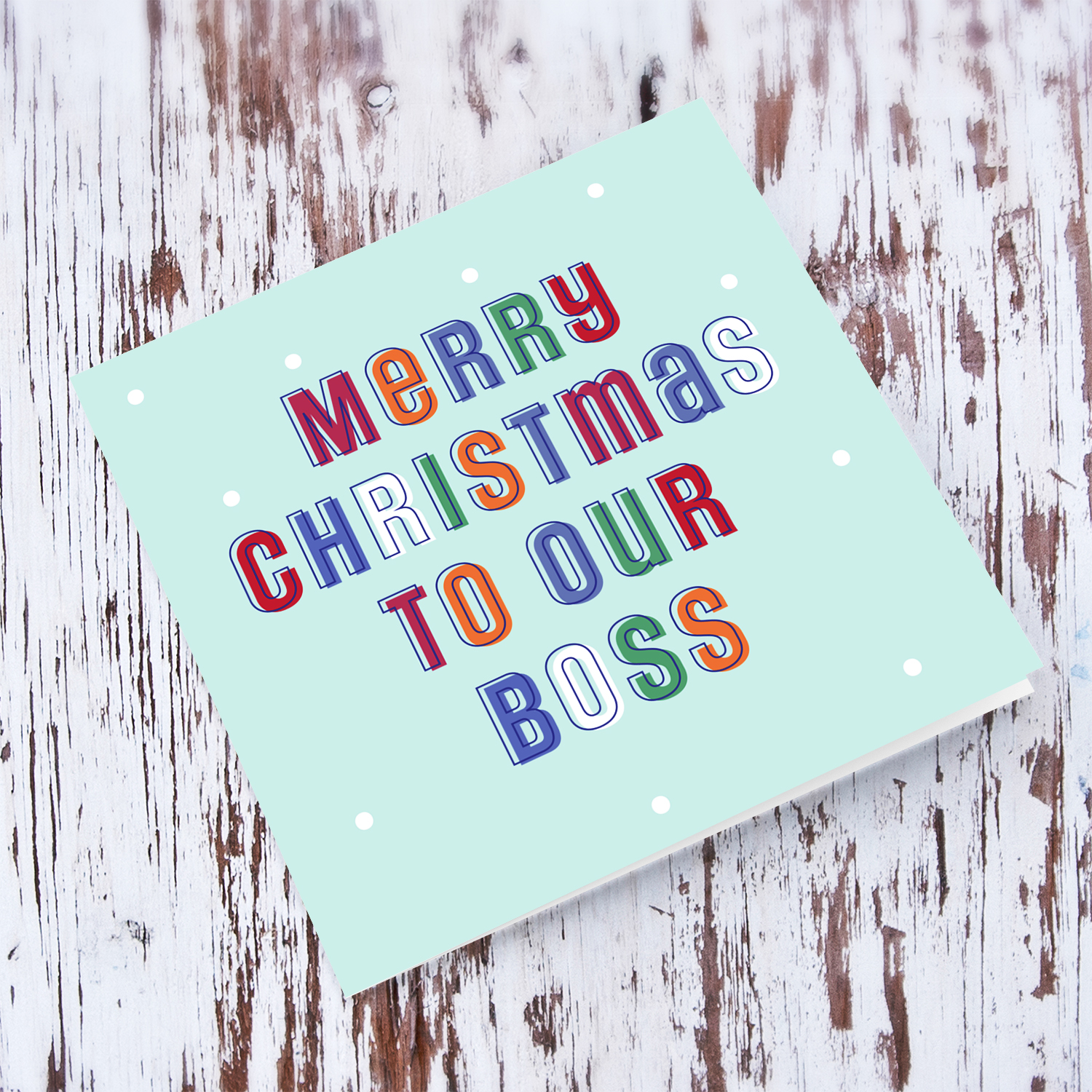 A cute Christmas card in a light blue background with colourful text for Boss in English