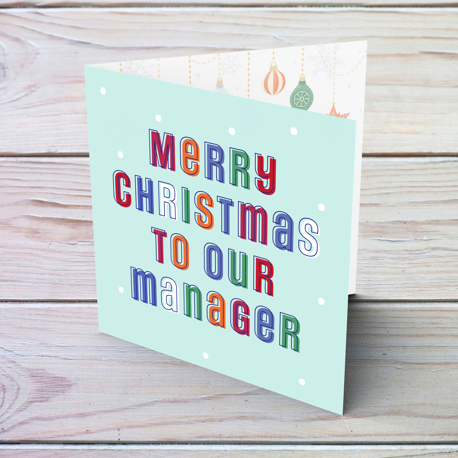 A cute Christmas card in a light blue background with colourful text for Manager in English