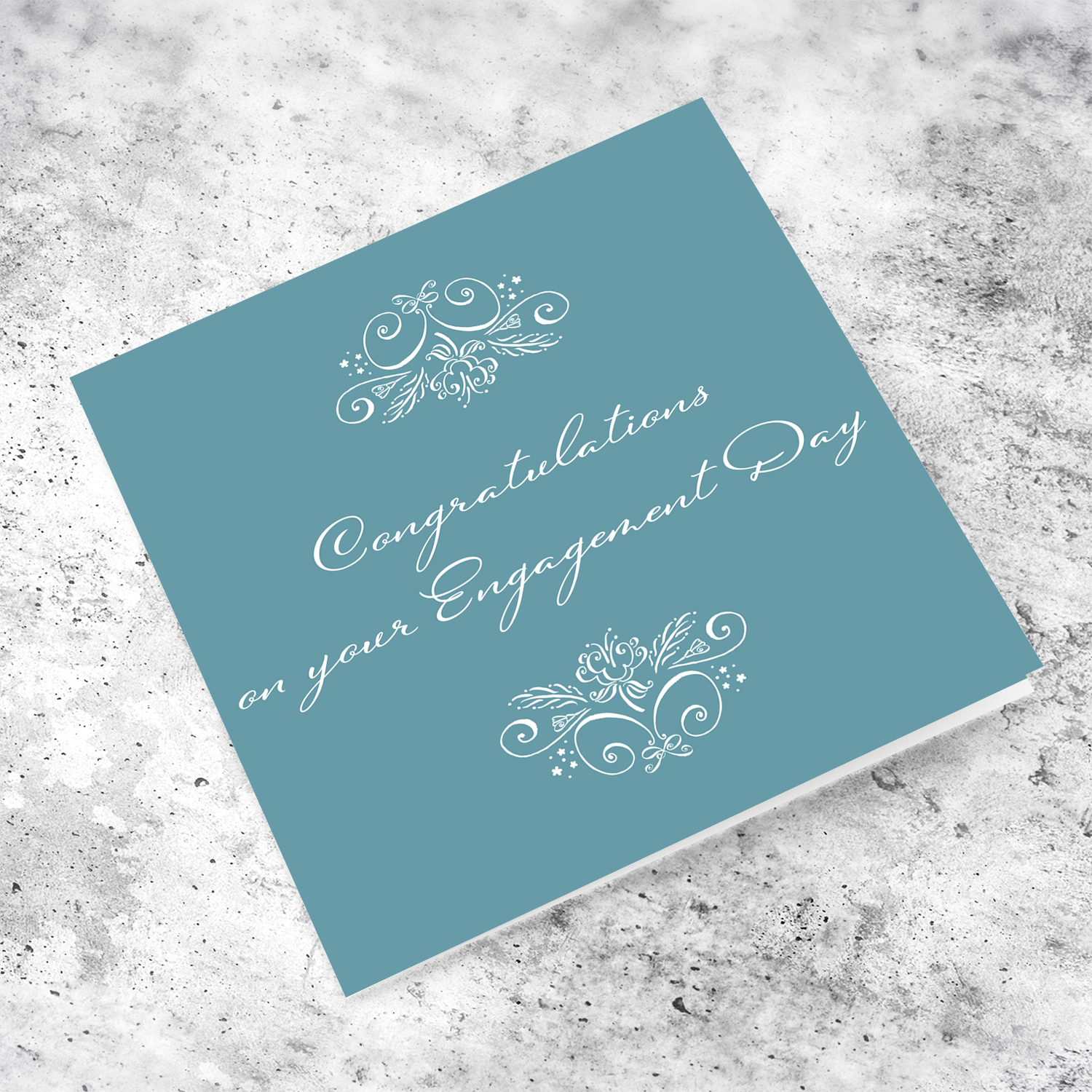 Elegant monochrome engagement card in a shade of blue background and white text in English (blank message inside)