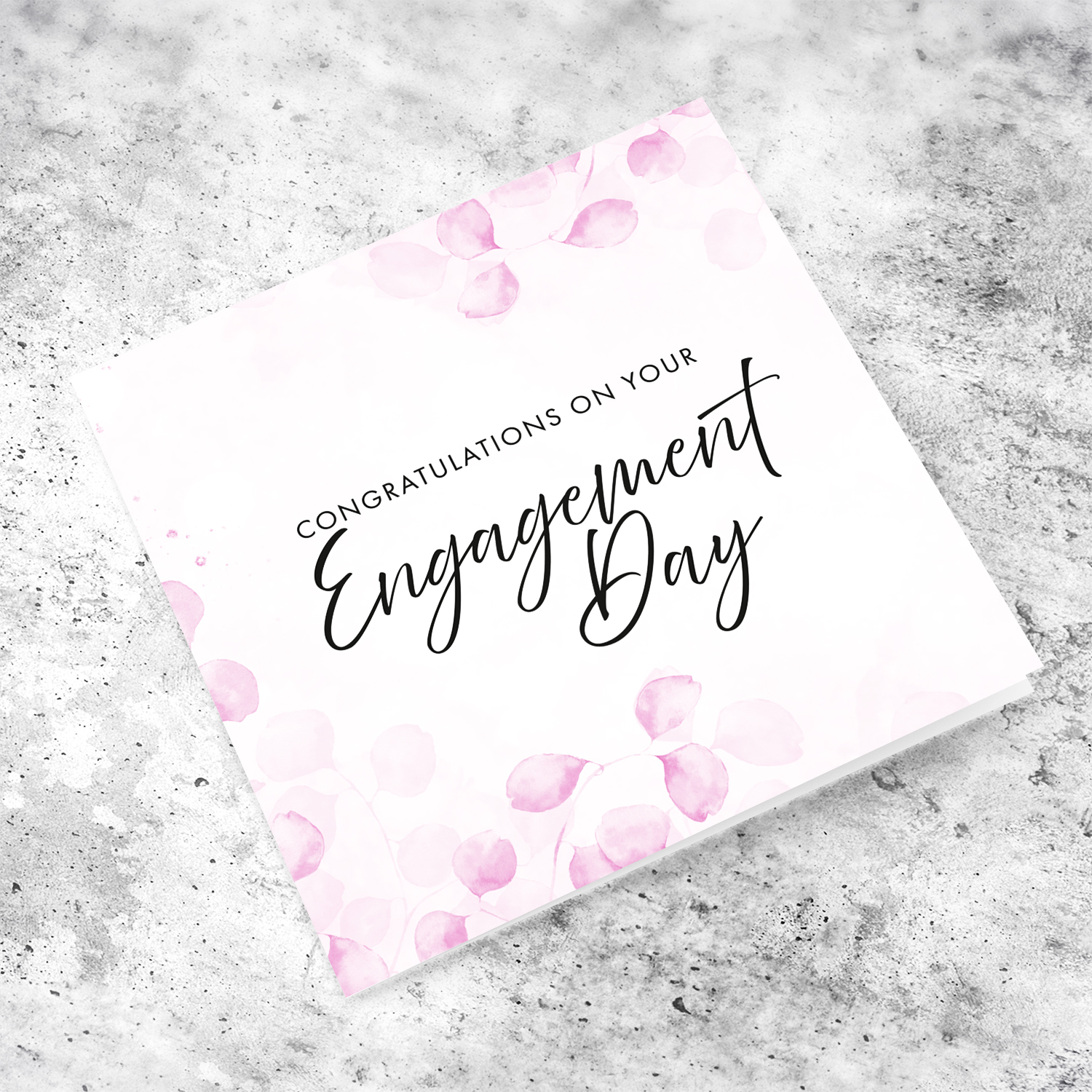 A dainty pink leave / plant background engagement card with black text in English 