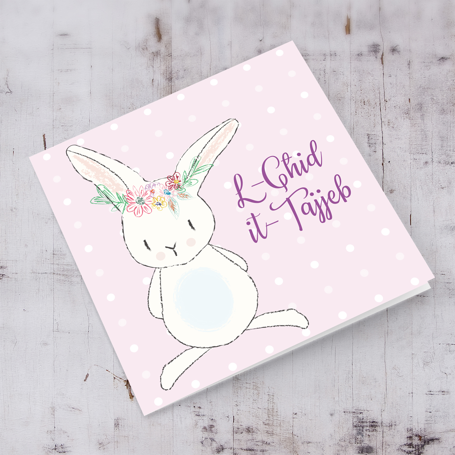 Bunny themed Easter card in Maltese with pink background and white polka dots