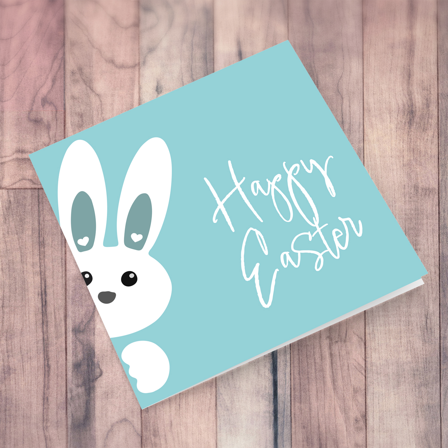 Cute bunny peeping out with blue background Easter Card in English