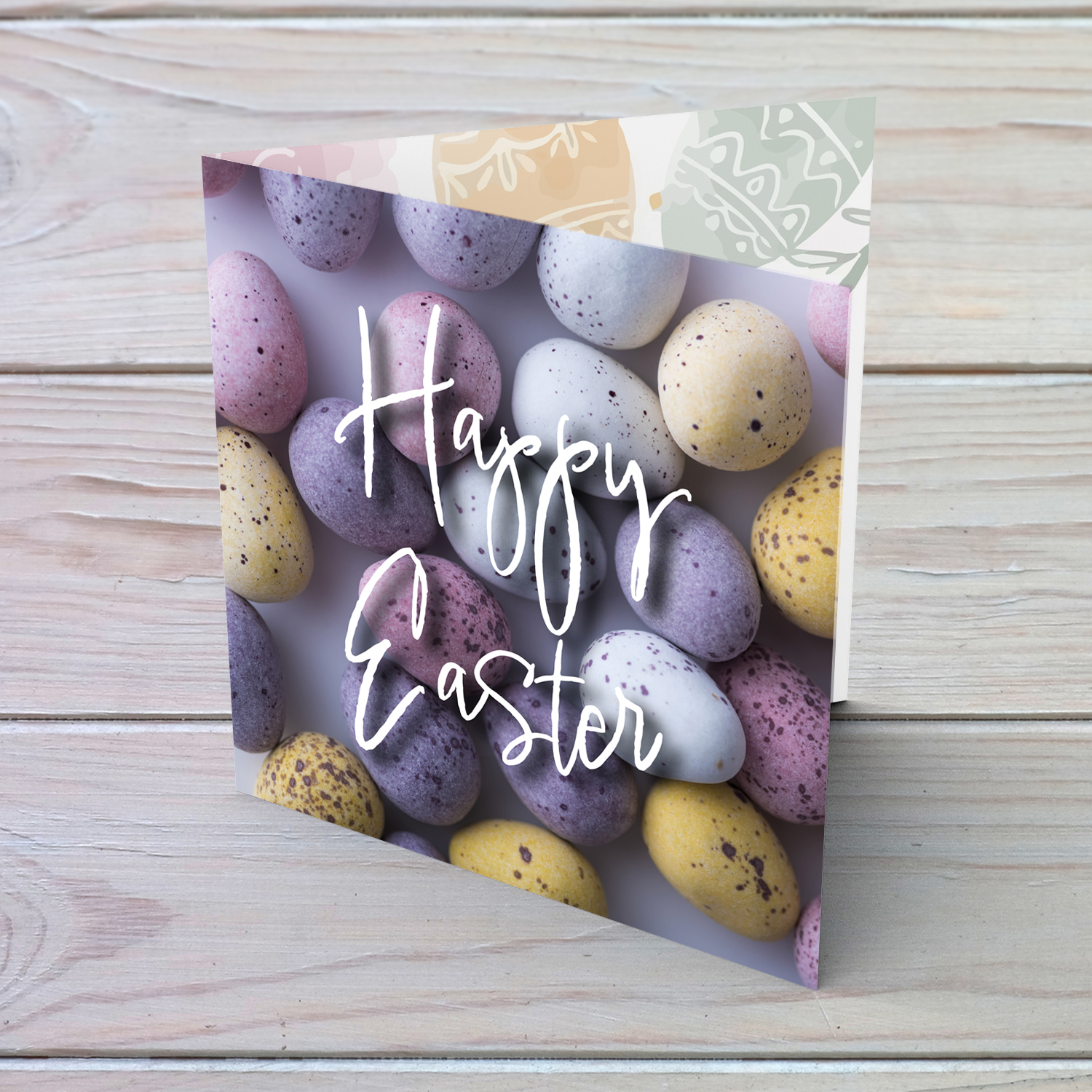 Easter egg themed Easter card purples, pinks and yellows in English