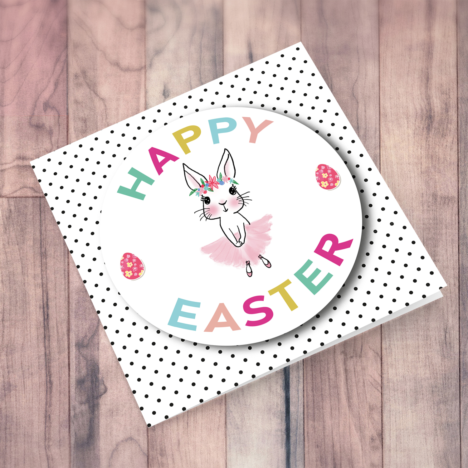Cute bunny Easter card with colourful text and polka dotted background in English