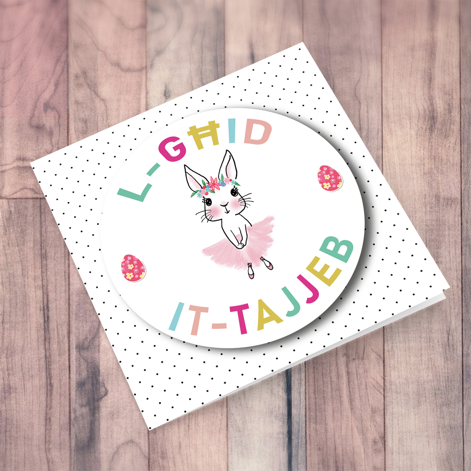 Cute bunny Easter card with colourful text and polka dotted background in Maltese