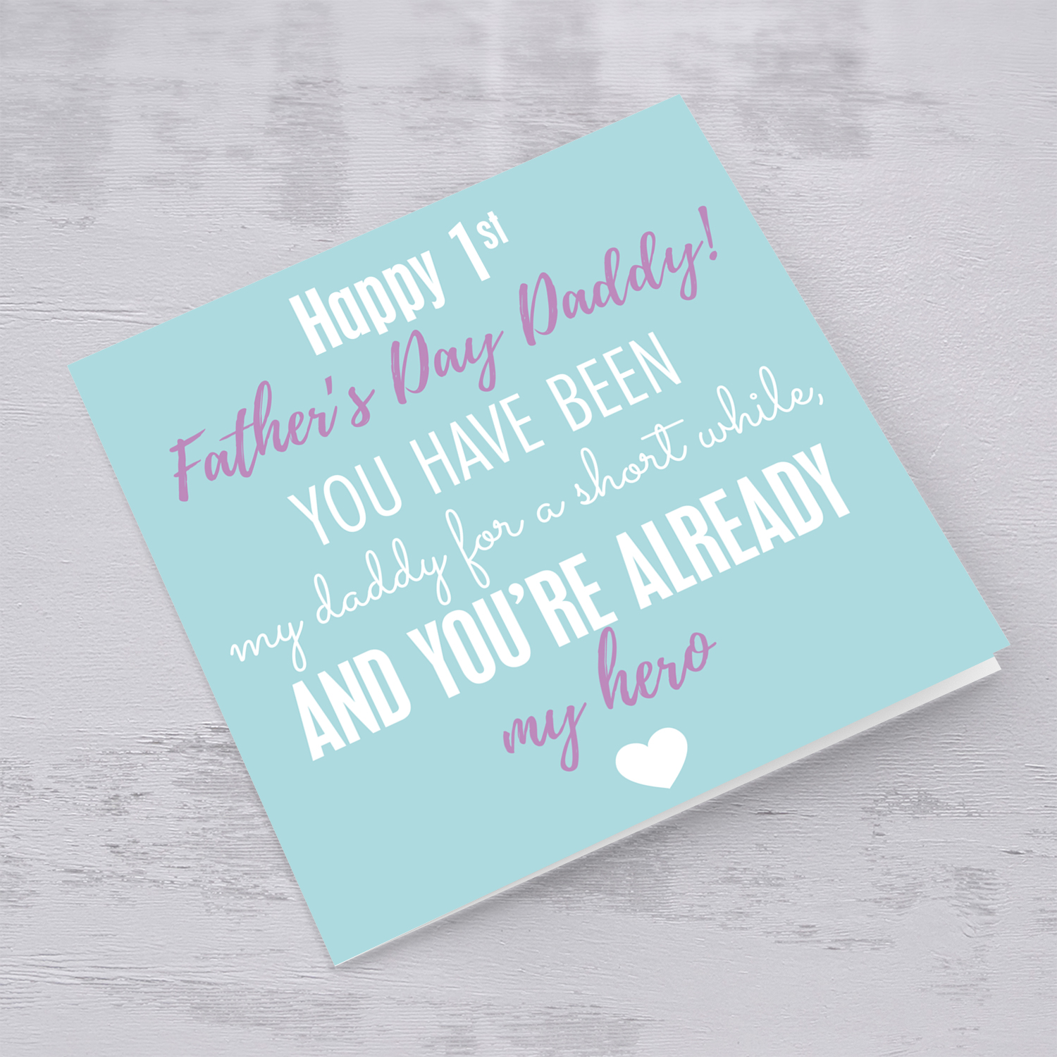 First Father's Day card in pastel green background and purple and white wording.