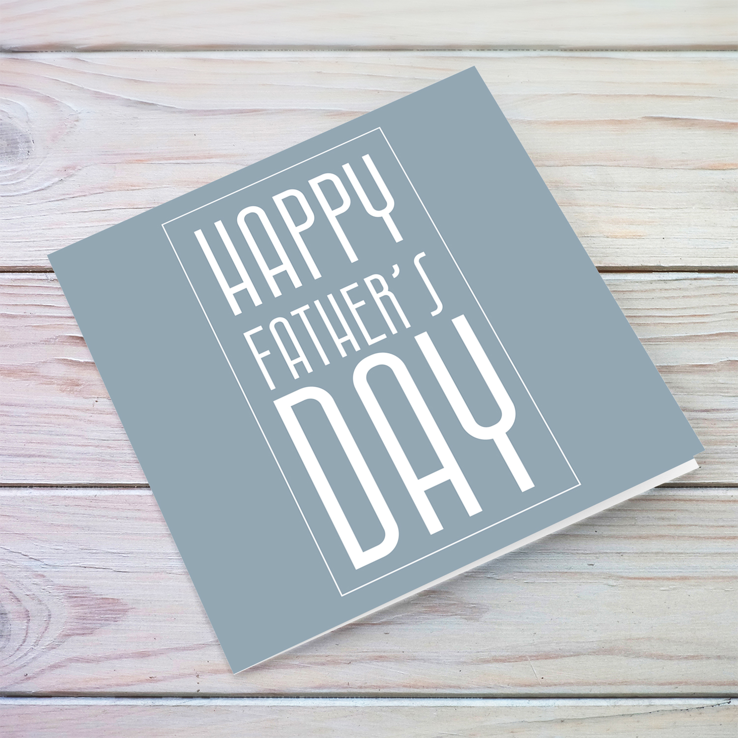 Minimalist father's day card in gray/blue background with white text in English