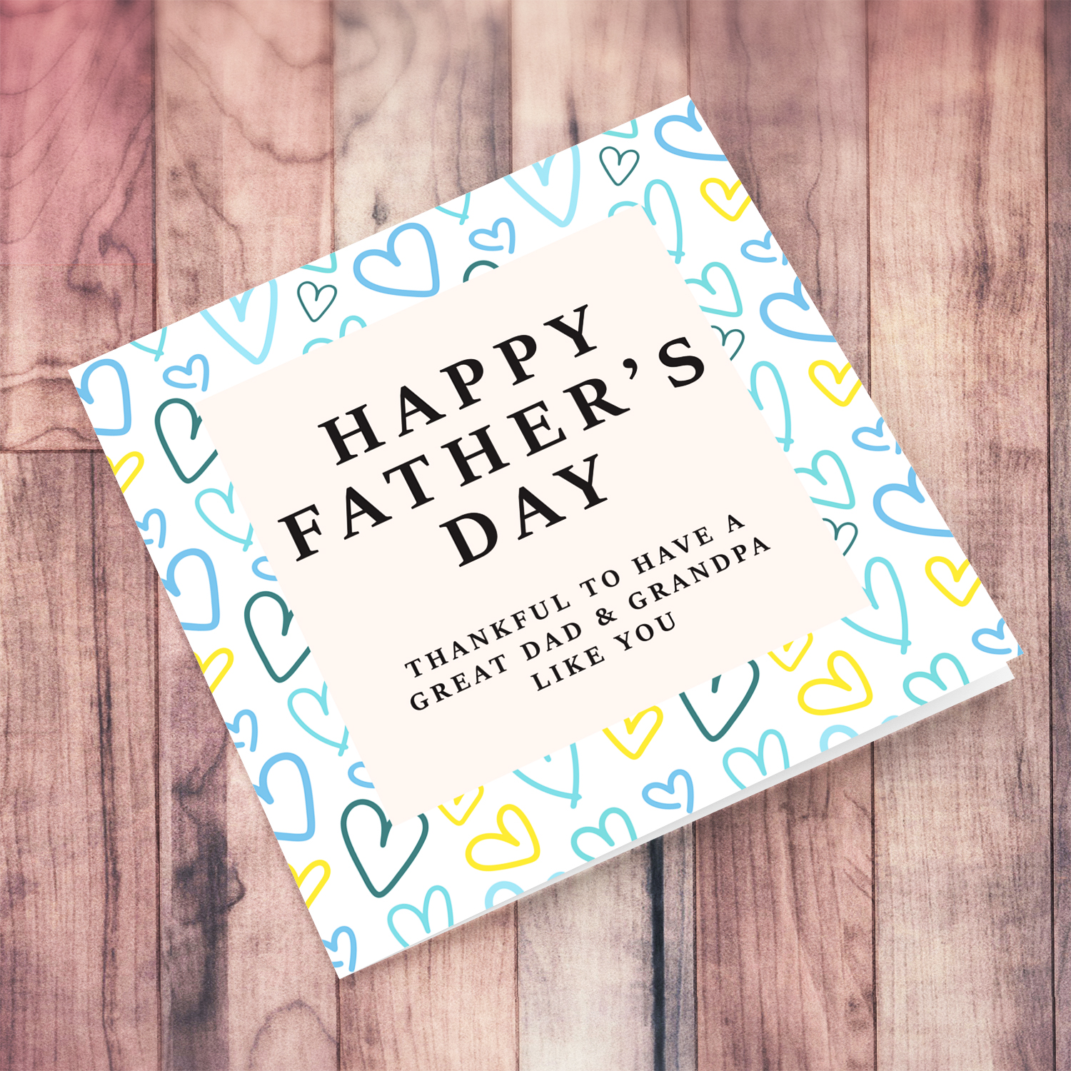 A beautiful father's day card for dad & grandpa, featuring a heart themed background in English