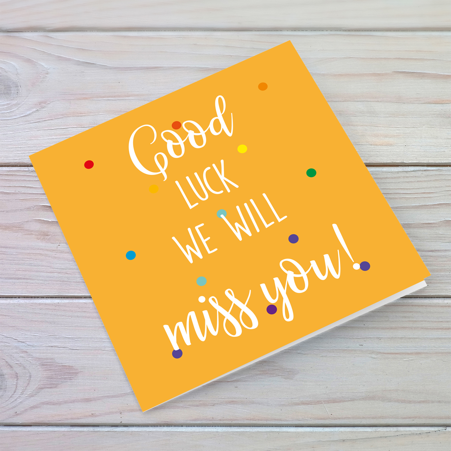 Orange background with various coloured dots Farewell card in English