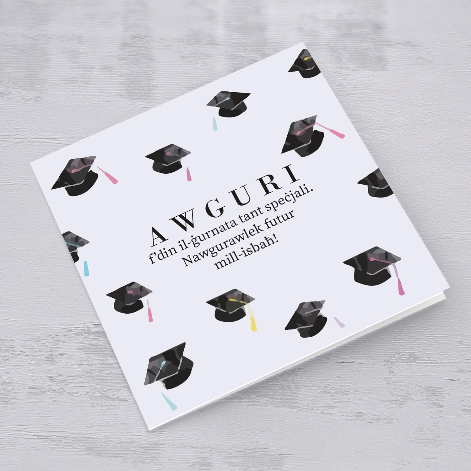 Graduation card with scattered party hats in English