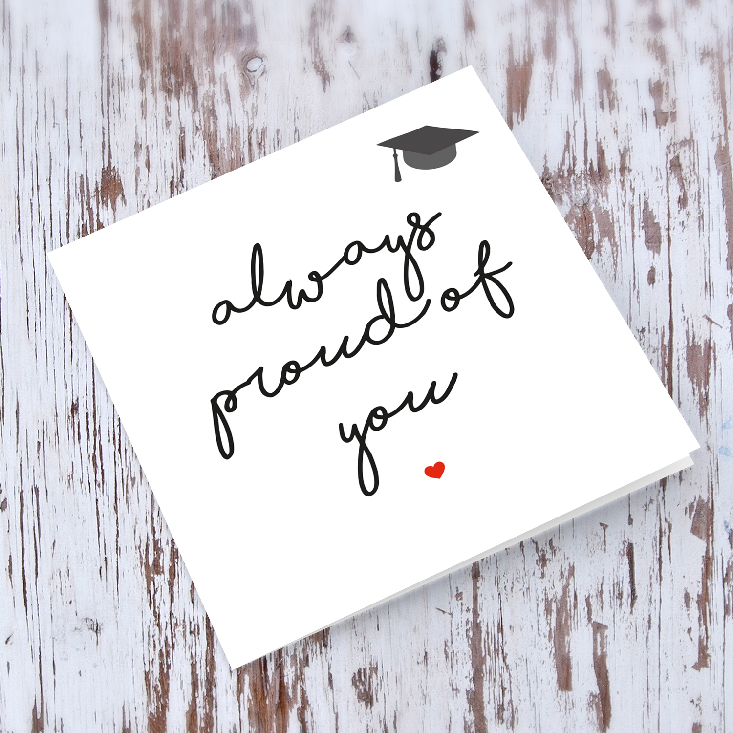 Minimalist Graduation Card with small graduation hat and red heart in English (unisex)