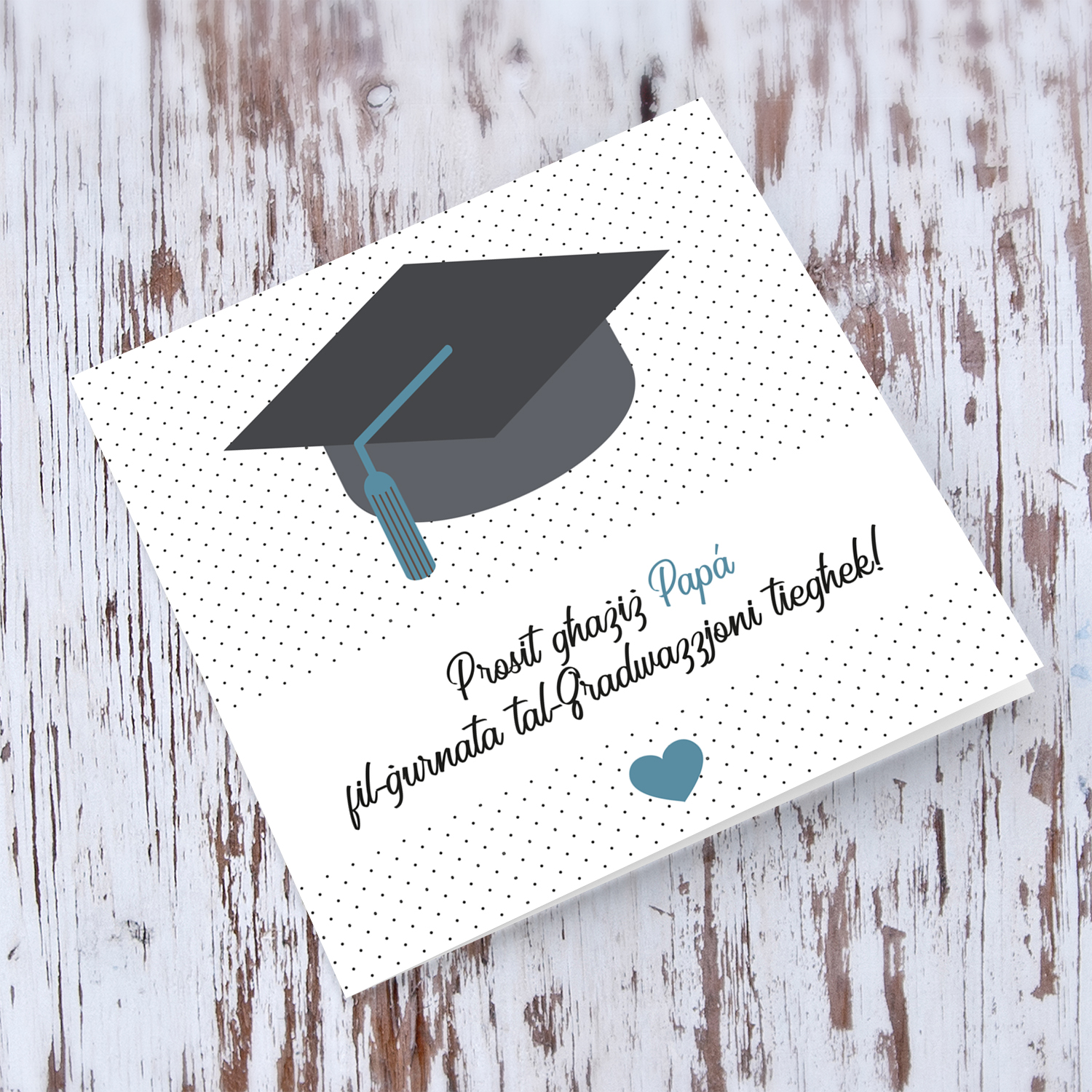 Dad Graduation card with dotted background, graduation hat and blue heart in Maltese