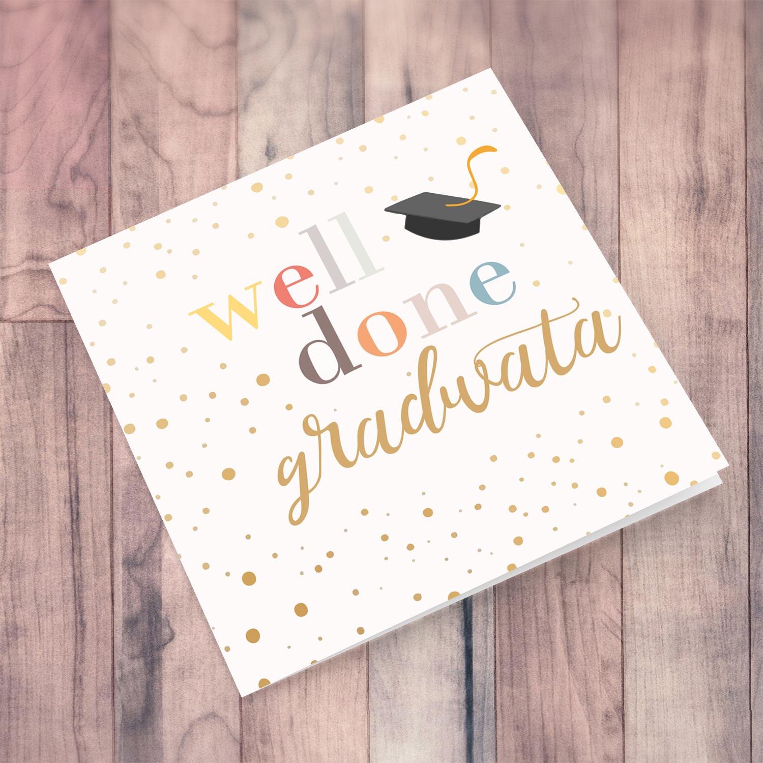 Well Done card - gradwata with colourful text, graduation hat and scattered spots in English & Maltese