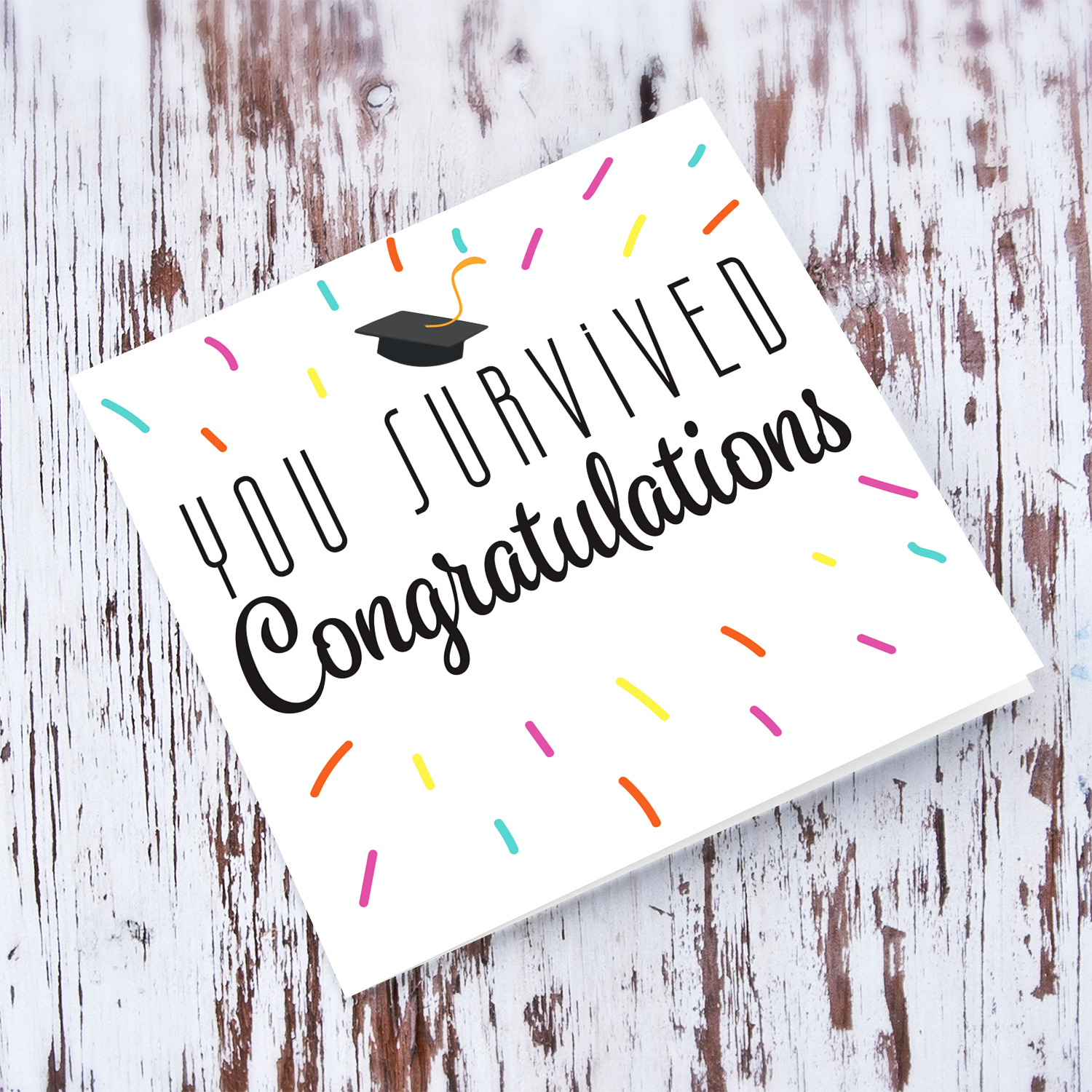 Colourful & funny graduation card - You Survived congratulations in English with pinkish confetti