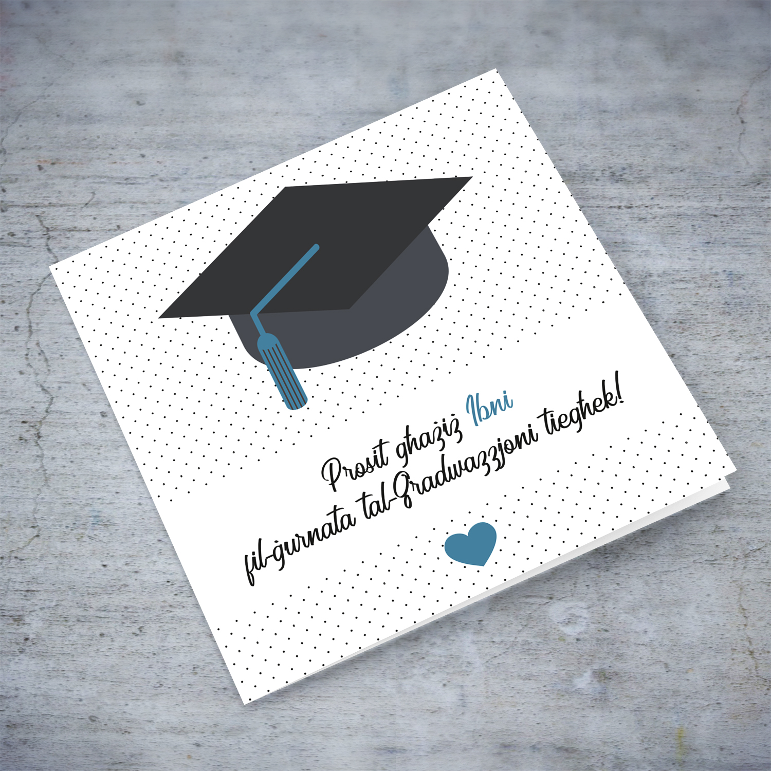 Son Graduation card with dotted background, graduation hat and blue heart in Maltese