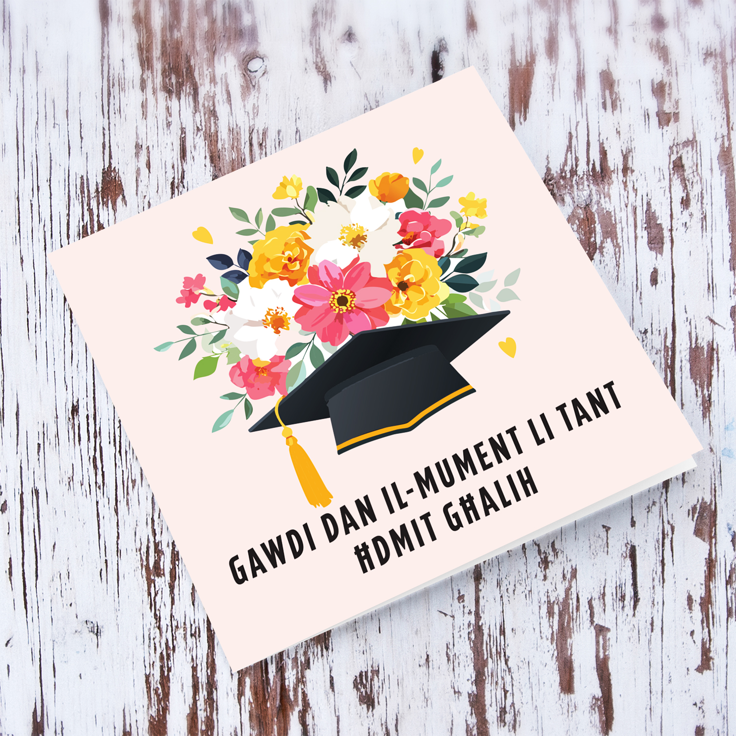 Flower themed personalisable graduation card with hat and flowers in a light pink background in Maltese