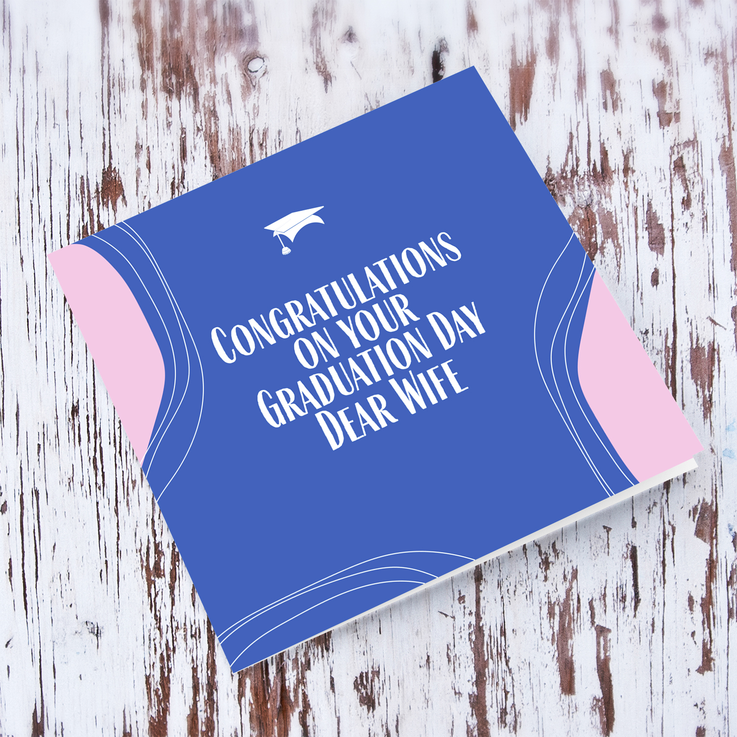 Modern background in blue with pink touches & graduation hat for Wife in English