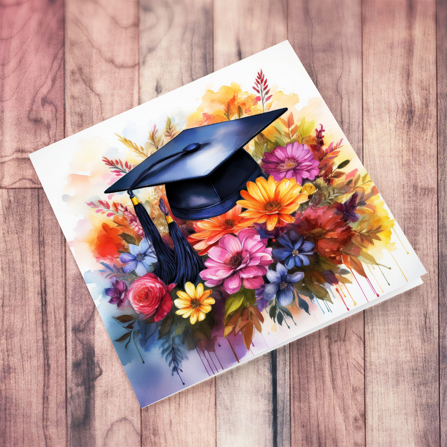 A beautiful watercolour graduation card with a graduation hat on a bouquet of colourful flowers and paint trickling down in Maltese