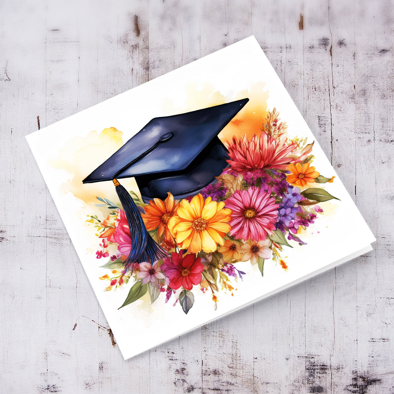 A beautiful watercolour graduation card with a graduation hat on a bouquet of colourful flowers in English