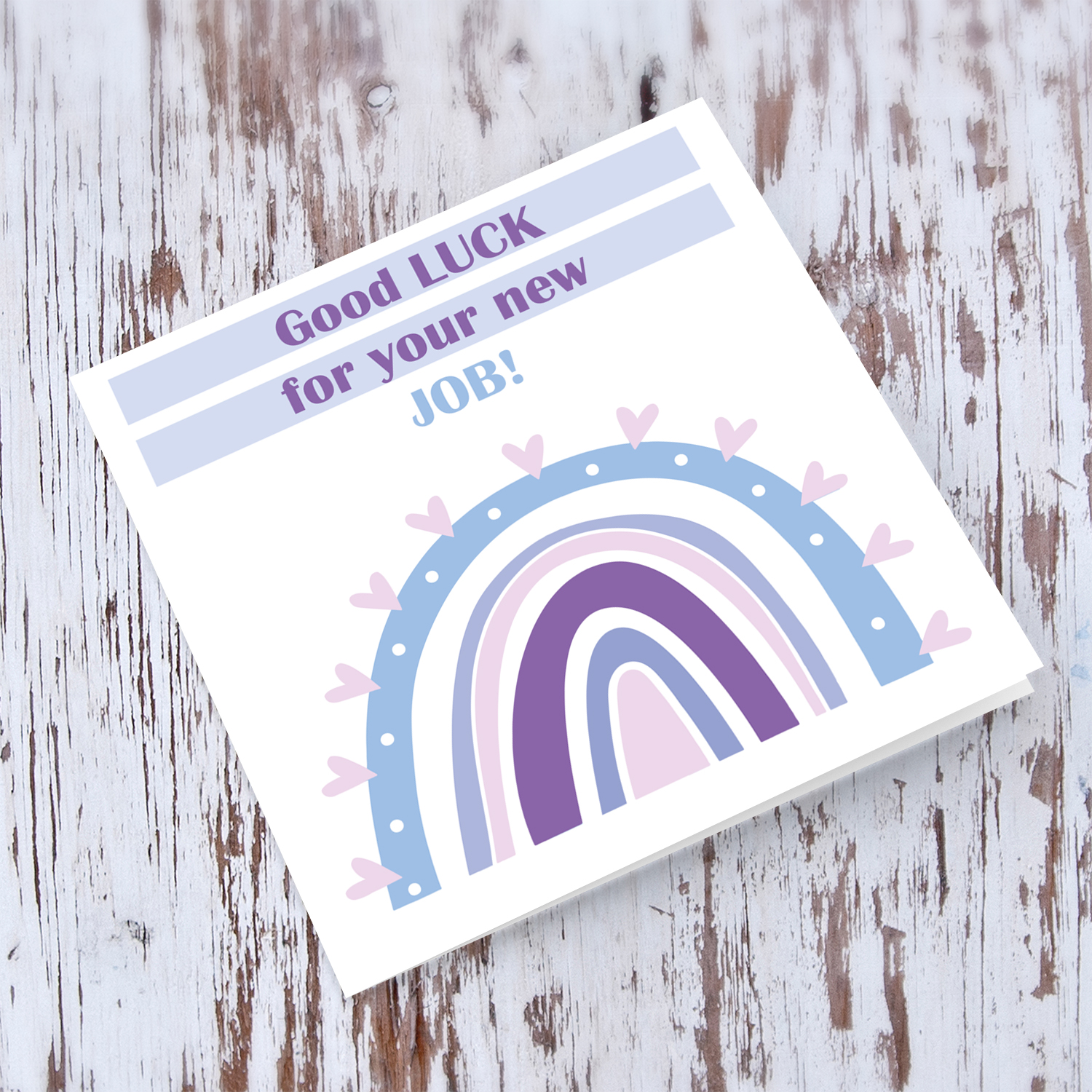Rainbow themed good luck card with rainbow in purples pink and blues in English