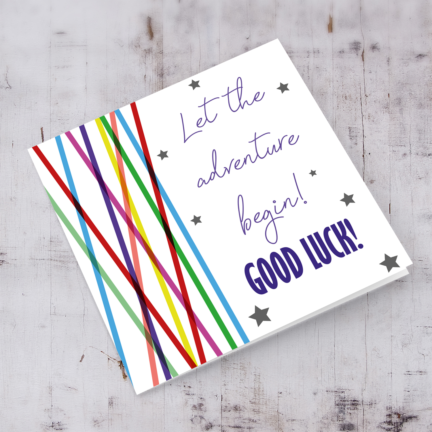 Colourful lines and scattered hearts - let the adventure begin good luck card in English