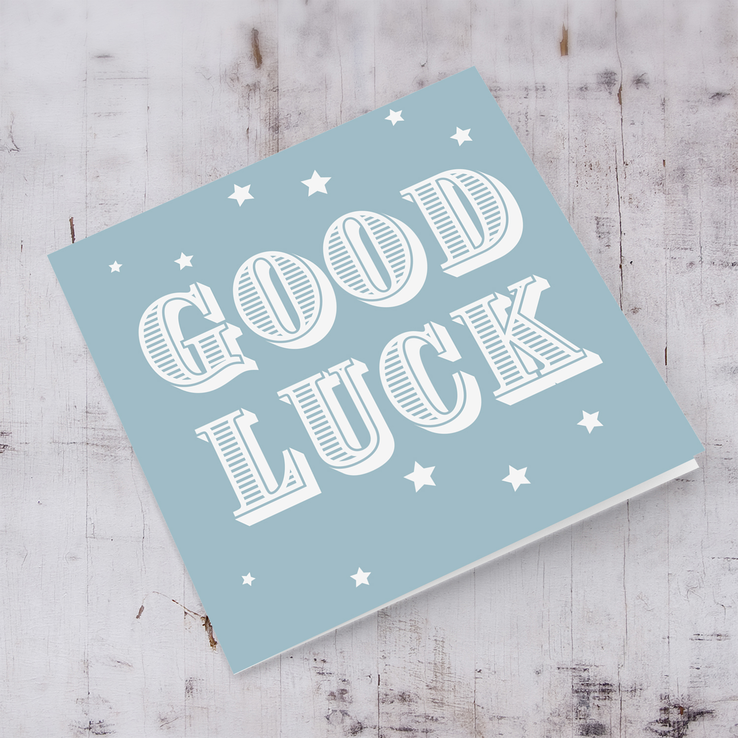Plain Good luck card with scattered stars in English