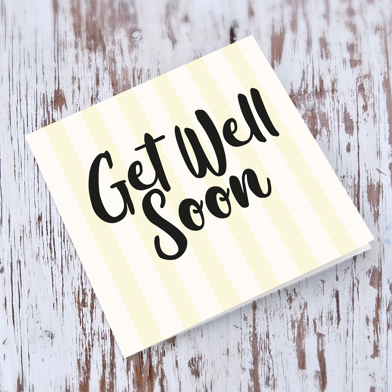 Off white and light yellow striped background get well soon card in English