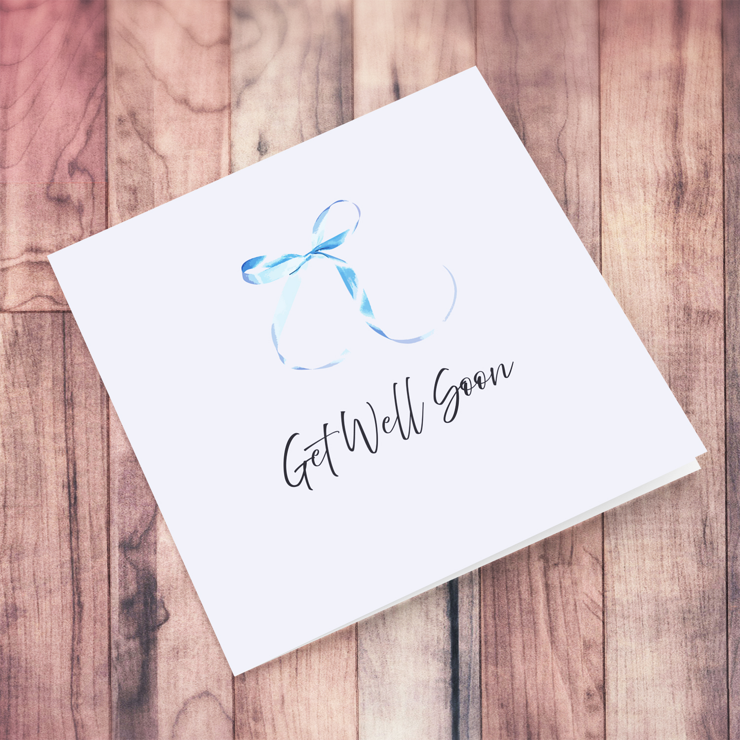 Minimalist and get well soon card with cute blue bow and light blue background in English
