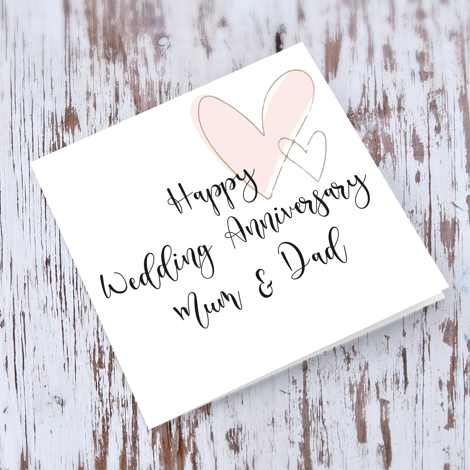 Wedding anniversary card for Mum & Dad with two hearts in English
