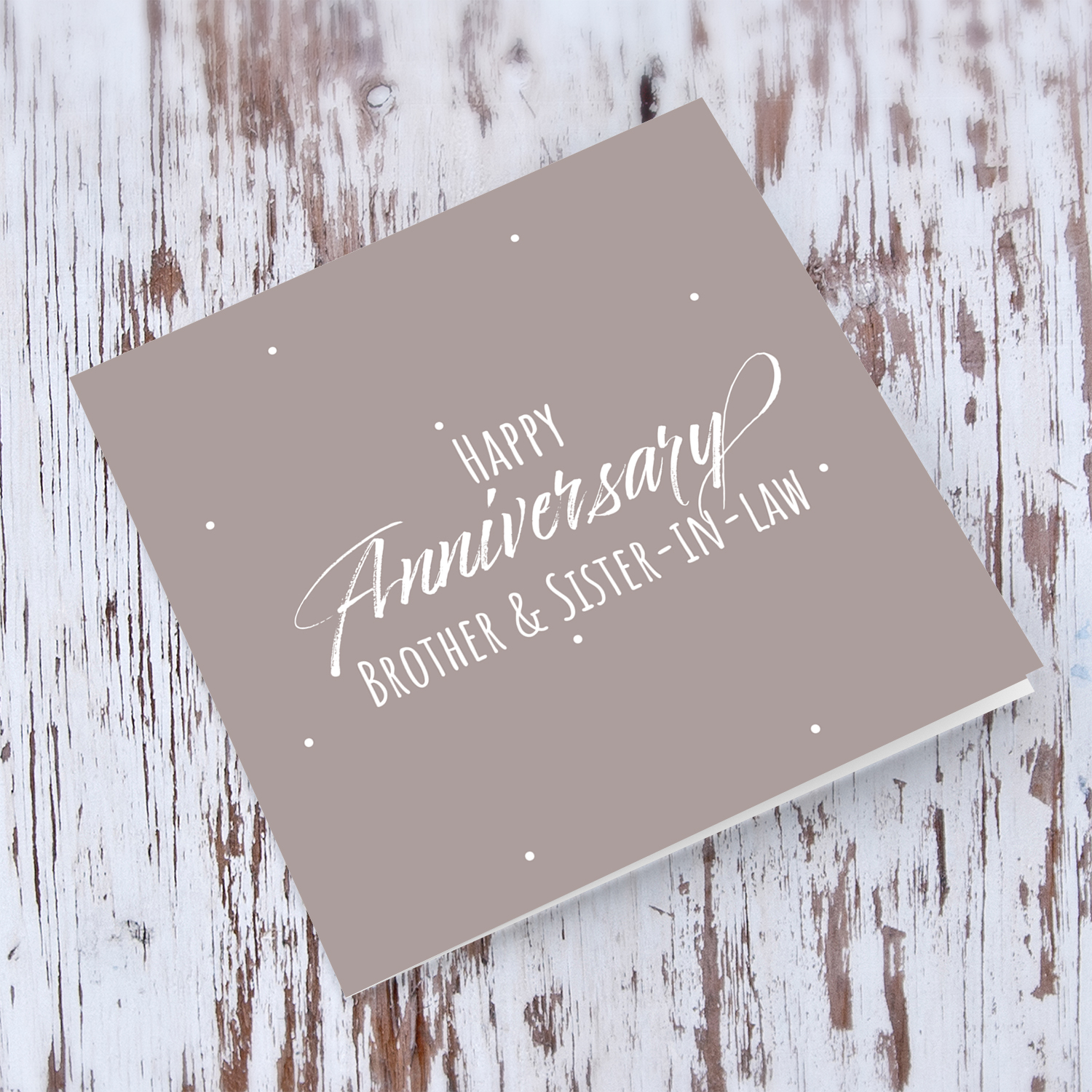 A minimalist Anniversary card for brother & Sister-in-lawin taupe background in English