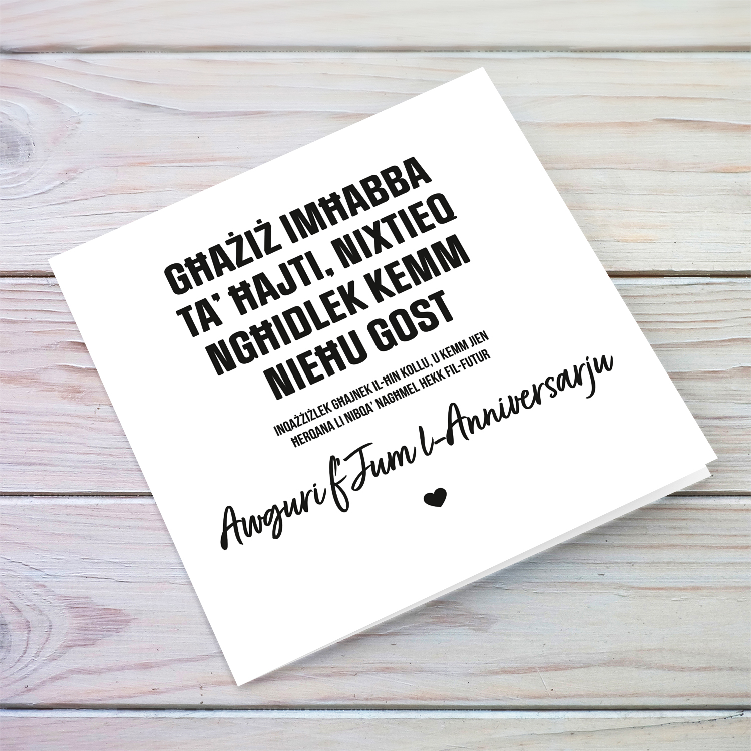 Funny minimalist anniversary card in black text in Maltese (Male)