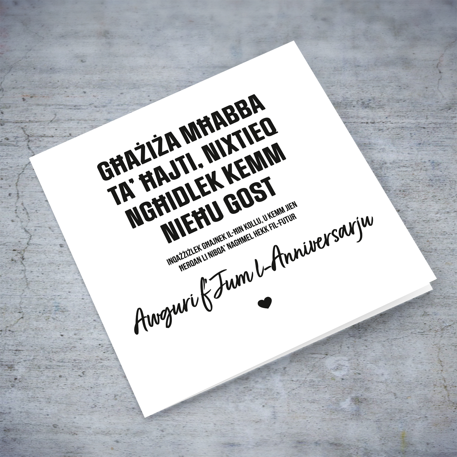 Funny minimalist anniversary card in black text in Maltese (Female)