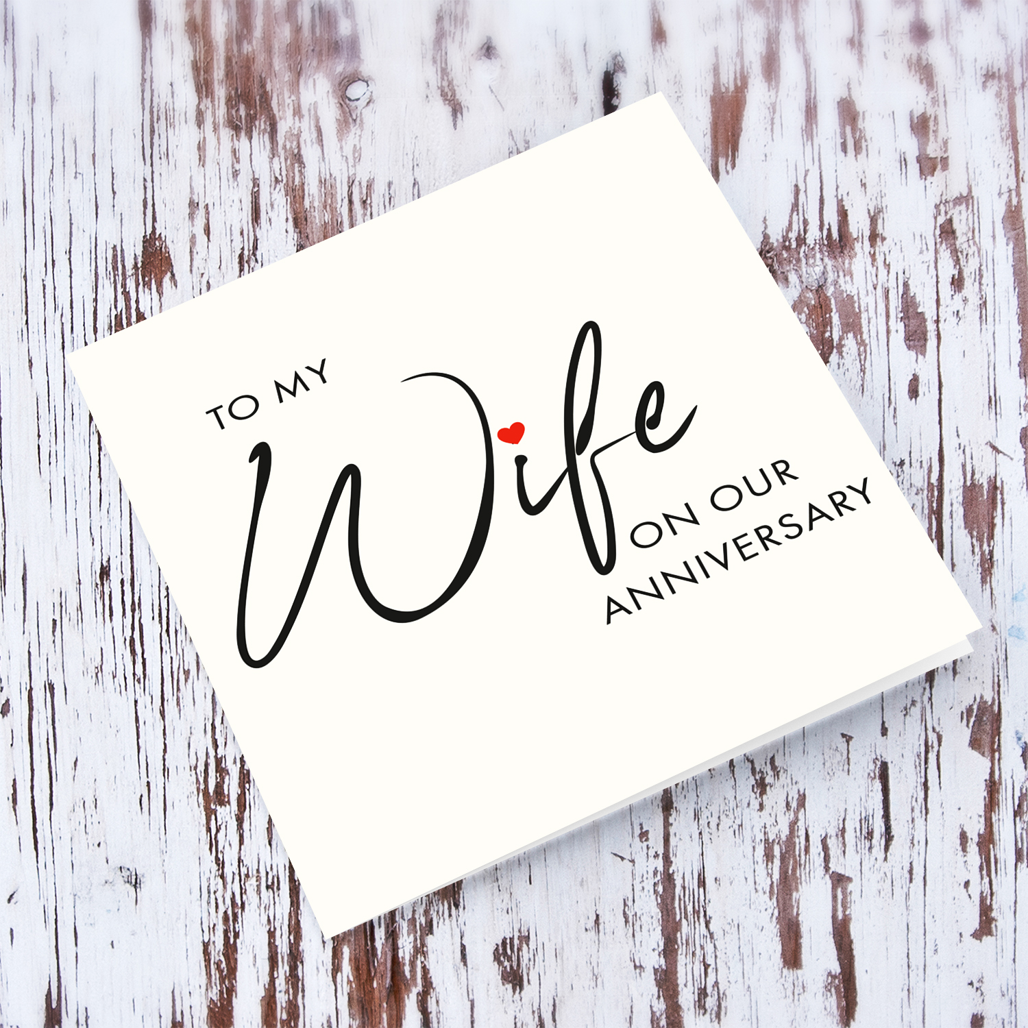Minimalist anniversary card for wife with red hearts in English